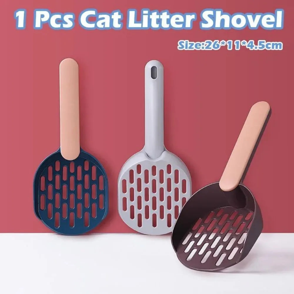 Blue plastic cat litter shovel scoop with drainage holes for cleaning a litter box.