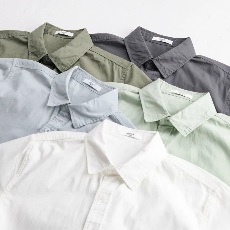 Men's loose fit pure cotton short sleeve shirt in cardigan style, shown in light blue.