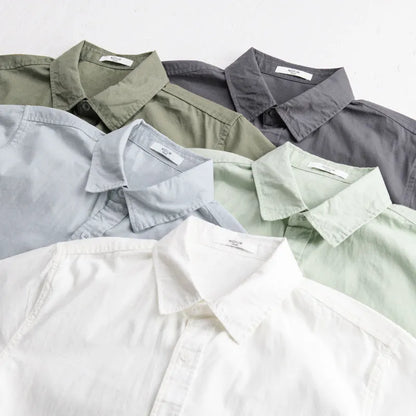 Men's loose fit pure cotton short sleeve shirt in cardigan style, shown in light blue.
