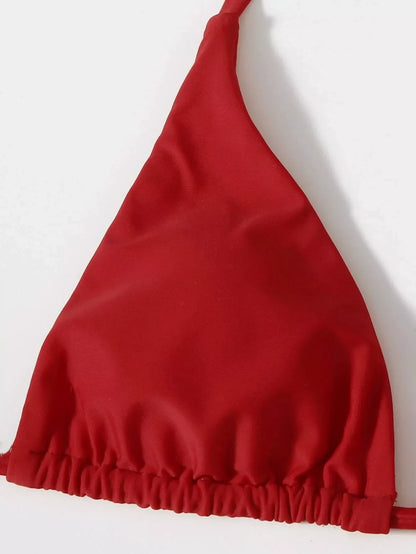 Women's three-piece mesh bikini swimsuit in vibrant colors, featuring a top, shorts, and skirt for versatile beachwear.