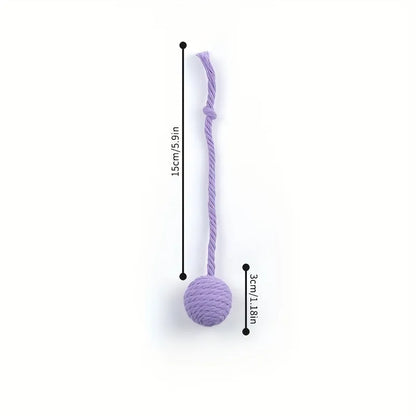 Interactive cat toy ball with bell and rope in green, pink, purple or yellow colours, shown in 3cm and 6cm sizes