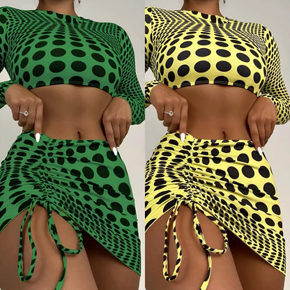 Green polka dot women's three-piece swimsuit set with top, skirt, and bra on hanger