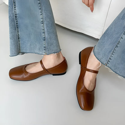 Women's brown sheepskin Mary Jane flat shoes with a round toe and strap