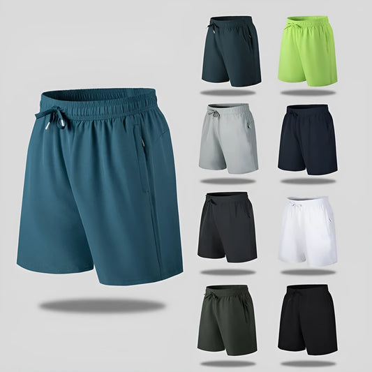 Man wearing black loose-fit ice silk sports shorts with a micro-elastic waistband, suitable for running or casual summer wear.
