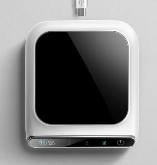 Black USB-powered cup warmer with three temperature settings and drinking reminder
