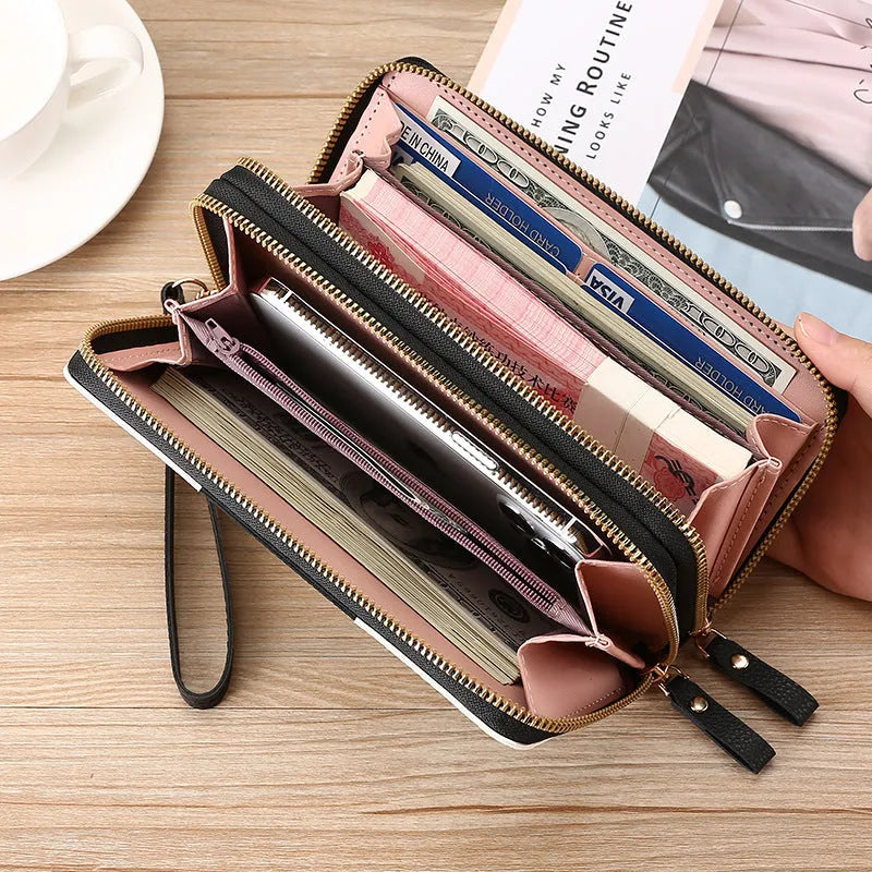 Long black retro-style PU leather wallet clutch with a printed pattern, showing a mobile phone pocket and a zippered coin purse.
