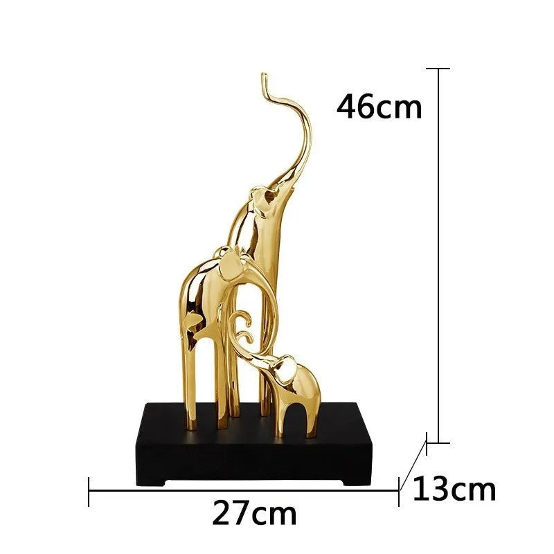 Fortune Bring Elephant resin decorative figurine in gold finish, 15cm tall on a wooden surface.