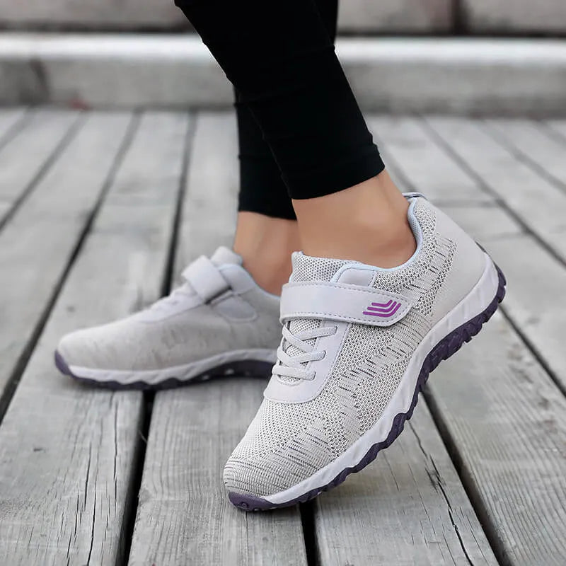 Women's grey purple soft sole velcro shoes with a low-top mesh upper and wedge heel.