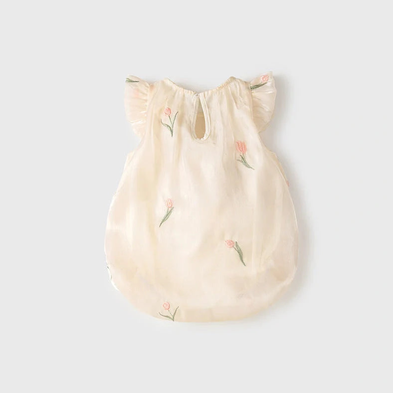 Apricot-coloured sleeveless baby jumpsuit with triangle design on hanger