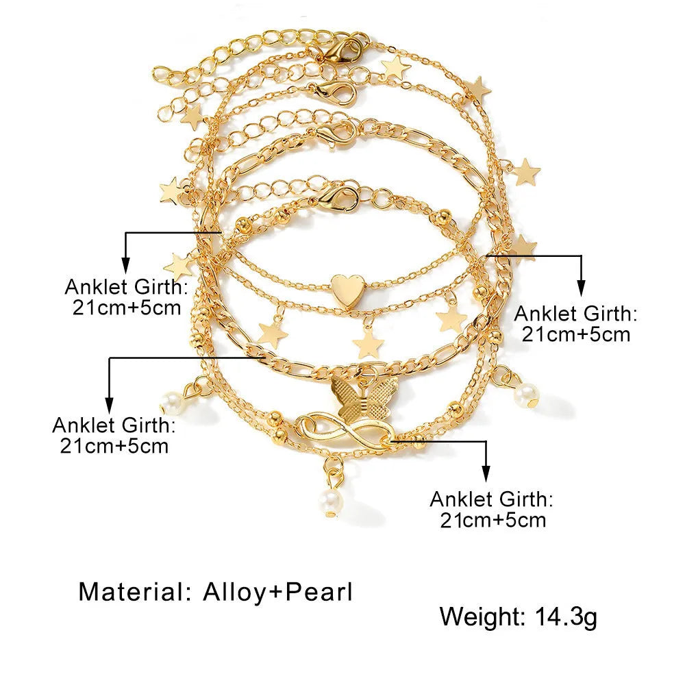 Four-piece women's anklet set with butterfly, pearl, and heart designs in alloy metal