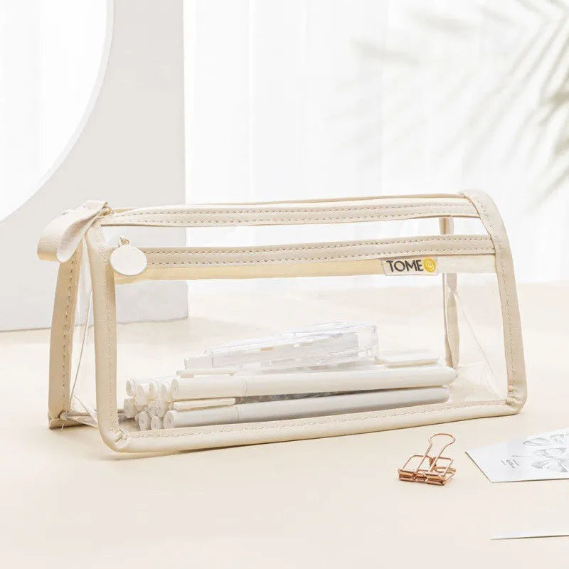 Transparent double-layer pencil case in blue showing organised stationery inside compartments