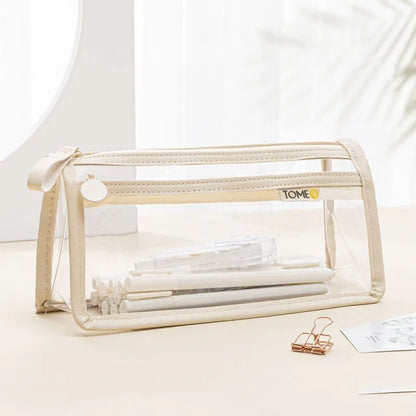 Transparent double-layer pencil case in blue showing organised stationery inside compartments