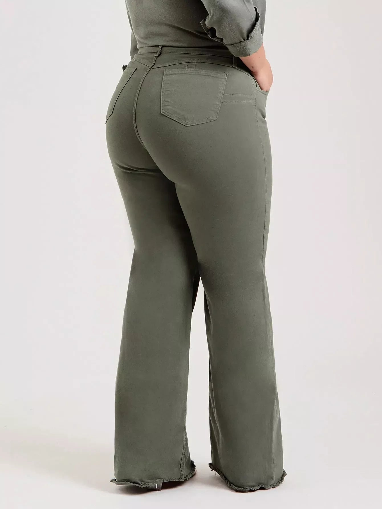 Slim fit stretch denim flared pants in olive green with micro flared design and zipper detail