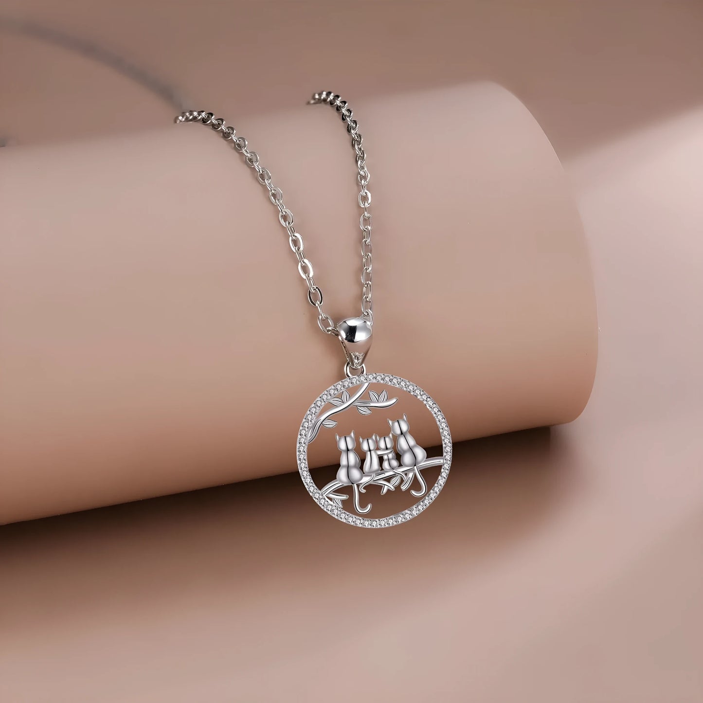 Copper necklace with a four kitten pendant on a cross chain, length 50 cm.