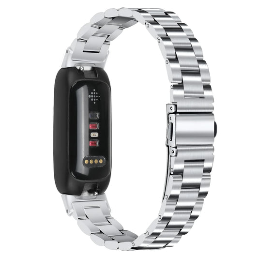 Three-bead stainless steel watch strap for Fitbit Inspire 3 in rose gold on a wrist
