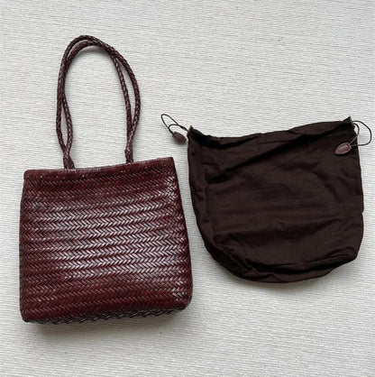 Brown woven cowhide leather tote bag with three-dimensional pocket, shown with dimensions 27cm by 30cm