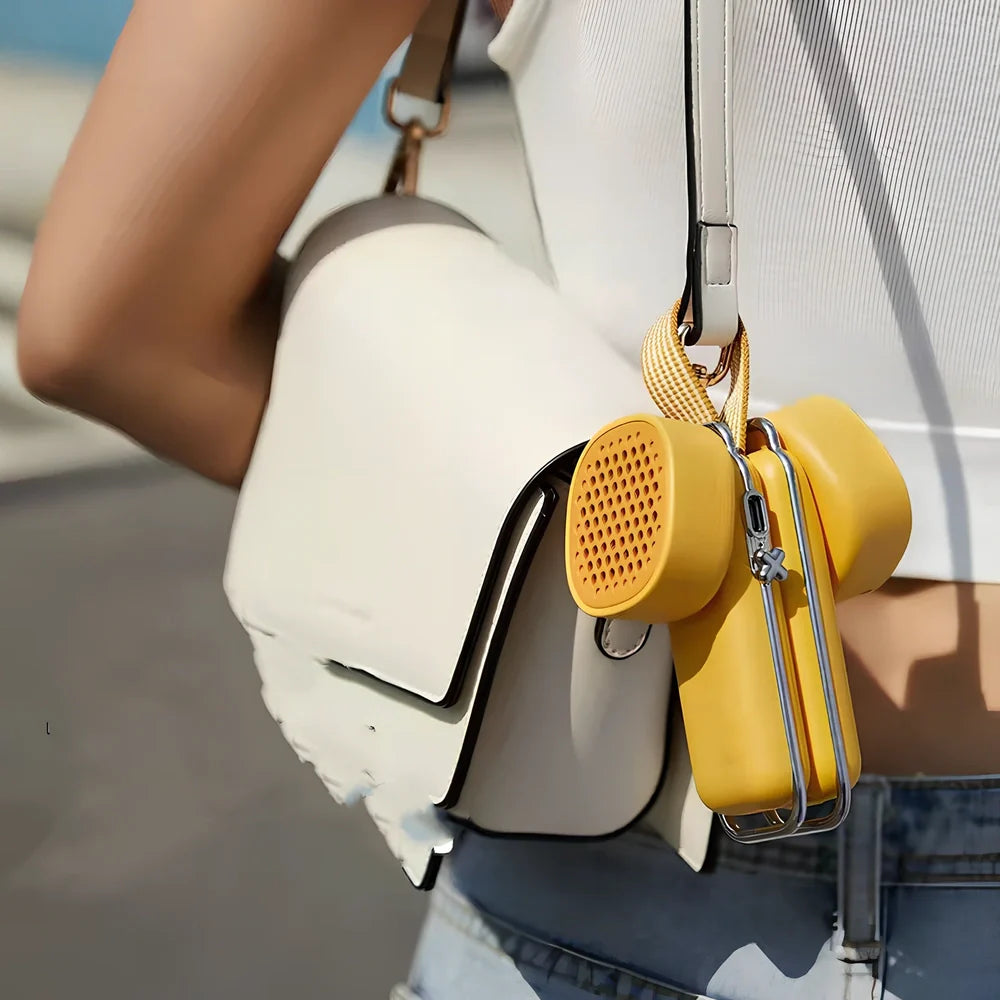 Folding USB mini portable fan in cream ice with 20cm blade and 50cm cord for summer cooling