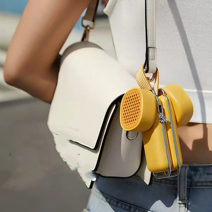 Folding USB mini portable fan in cream ice with 20cm blade and 50cm cord for summer cooling