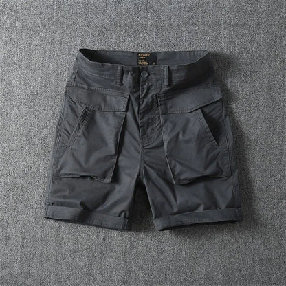 Men's straight-leg cargo shorts in Army Green with multiple pockets, showing micro-elastic cotton fabric detail