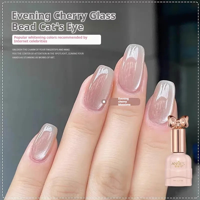 Bottle of micro glass bead cat's eye gel nail polish for magnetic nail art.