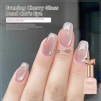 Bottle of micro glass bead cat's eye gel nail polish for magnetic nail art.
