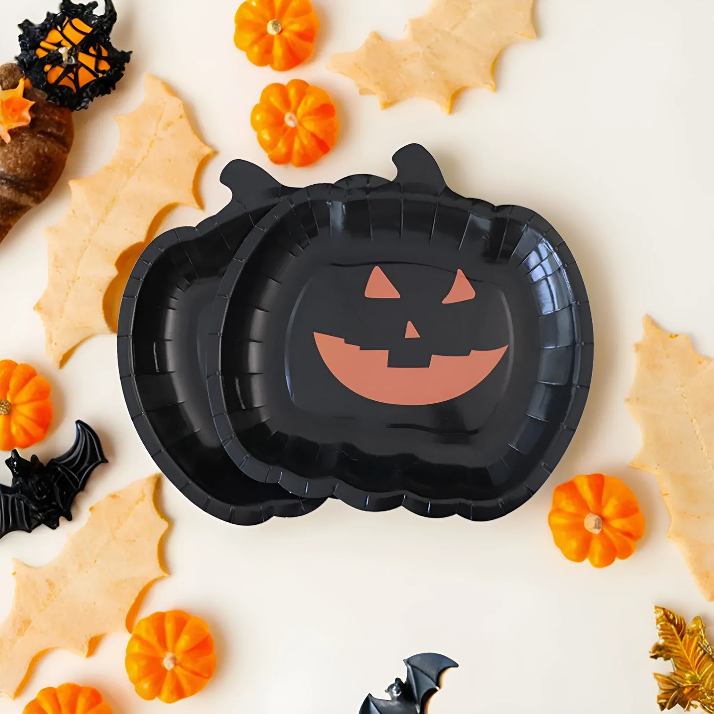 Black pumpkin design disposable paper plates for Halloween, 9-inch diameter
