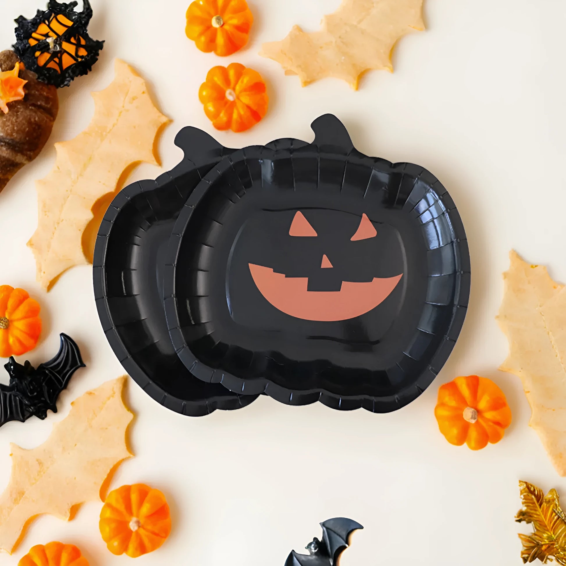 Black pumpkin design disposable paper plates for Halloween, 9-inch diameter