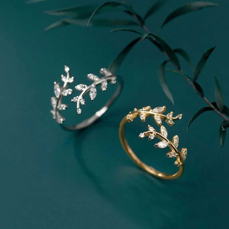 Women's fashion branch ring with leaf design in silver and gold finishes