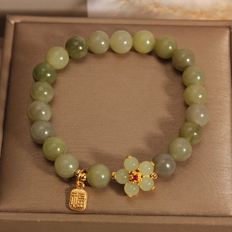 Women's casual bracelet with a grey jade stone set in an alloy metal band.