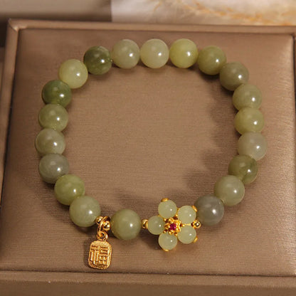 Women's casual bracelet with a grey jade stone set in an alloy metal band.