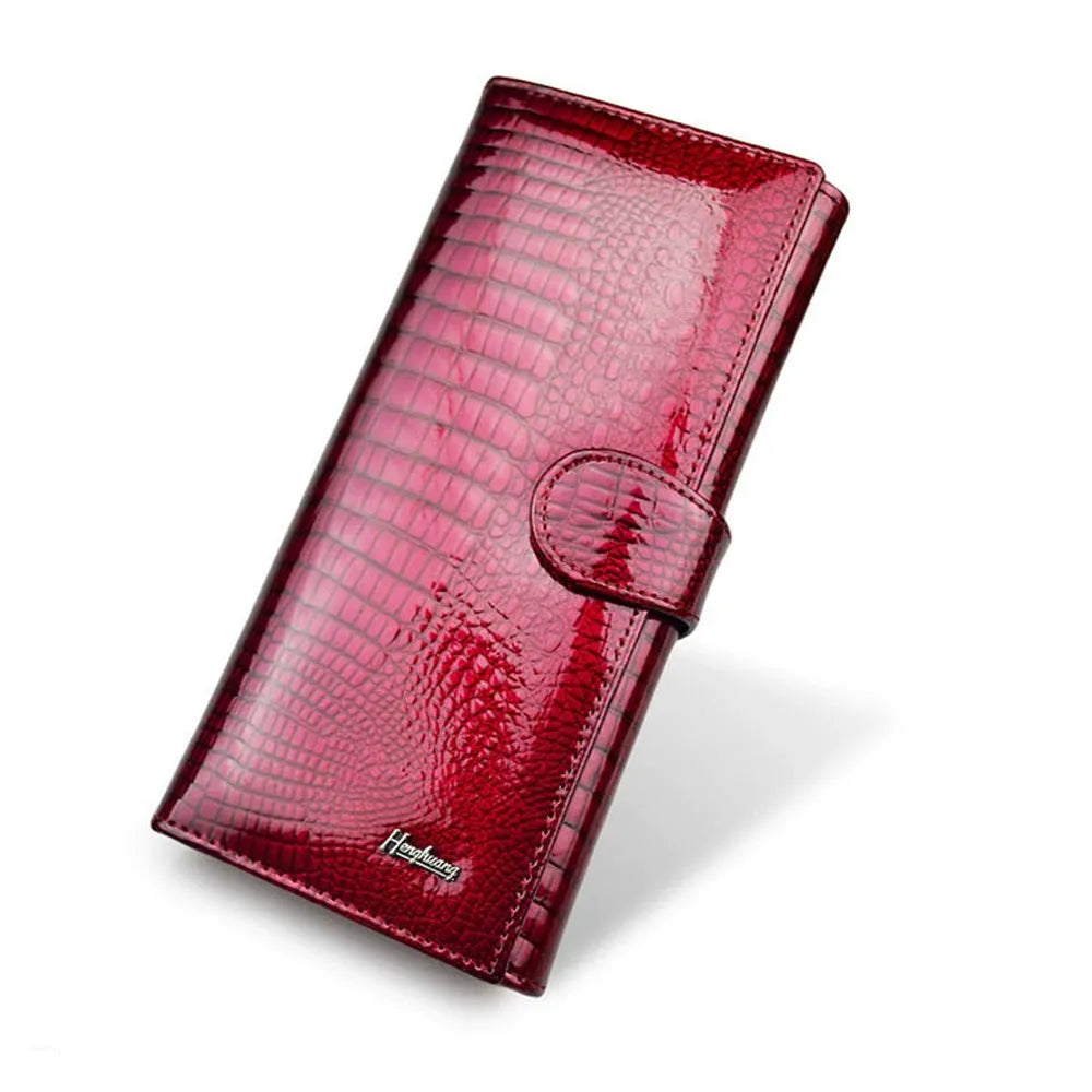 Wine red crocodile pattern genuine leather women's coin purse with pigskin lining.