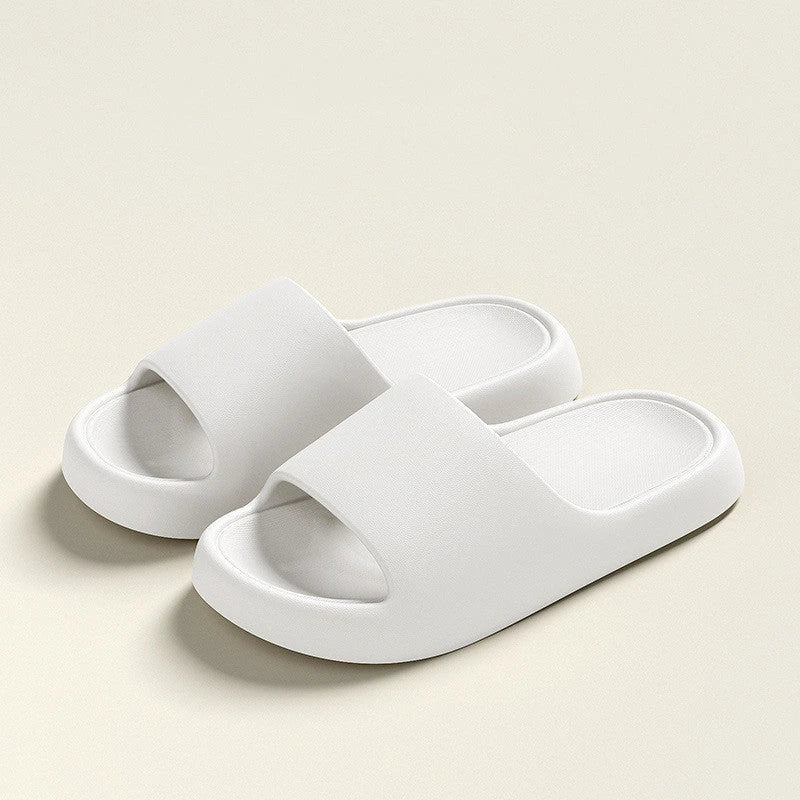 Cozy EVA foam slippers in a variety of vibrant colors with thick, cushioned soles and a slip-resistant design for comfortable indoor wear