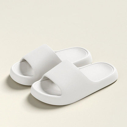Cozy EVA foam slippers in a variety of vibrant colors with thick, cushioned soles and a slip-resistant design for comfortable indoor wear