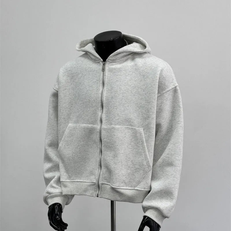 Light grey men's backpack design hooded coat jacket on a hanger.