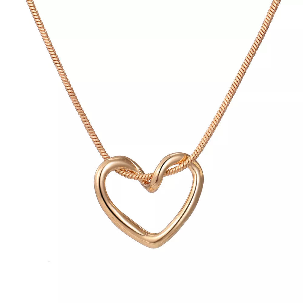Niche Hollow Heart Necklace for women with snake bones chain and electroplated alloy