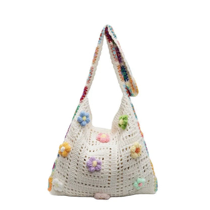 Woven polyester shoulder bag showing hollow knitting texture and single 41cm strap in neutral colour