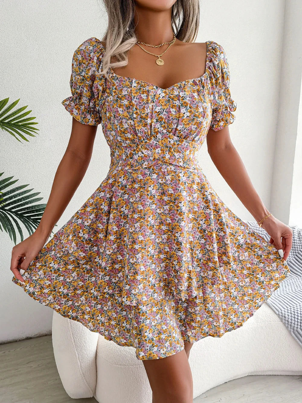 Elegant floral mini dress with A-line silhouette and short sleeves in a variety of vibrant colors