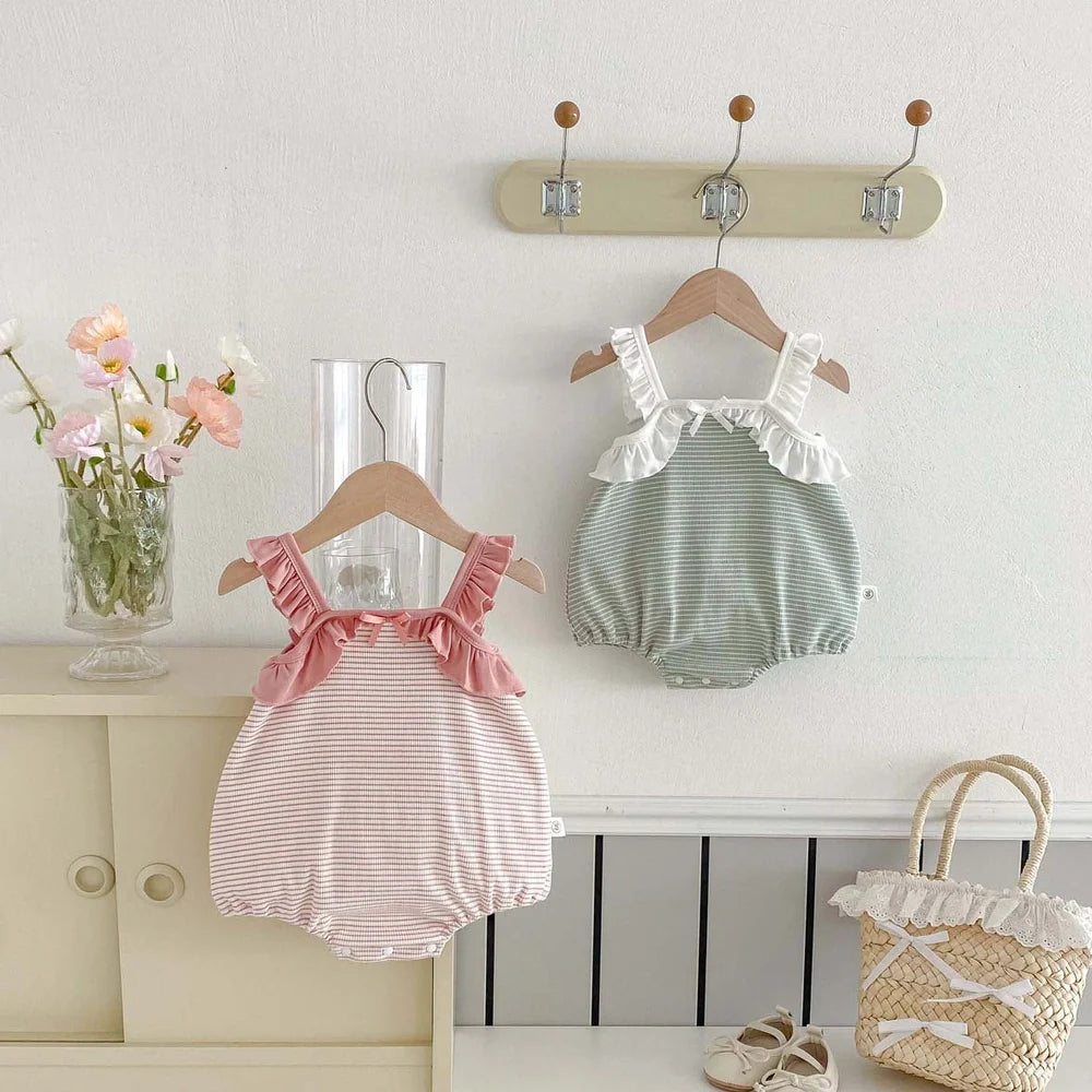 Girls' light green cotton jumpsuit with triangle design and sleeveless cut for summer wear