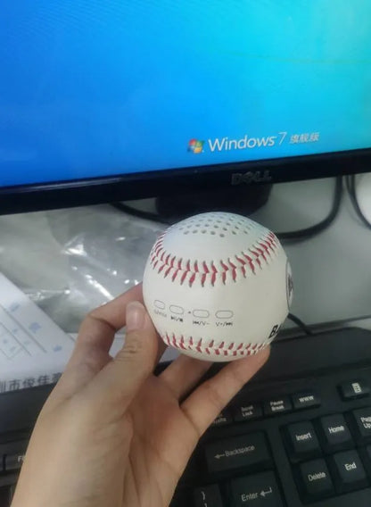 Baseball home design Bluetooth speaker in green colour showing front grille and USB port