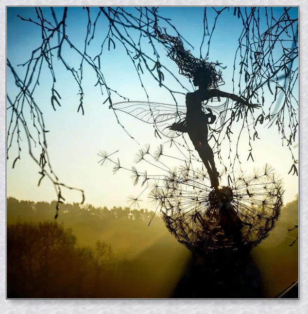Metal fairy garden decoration with magical dandelions dancing in the wind, enchanting outdoor decor