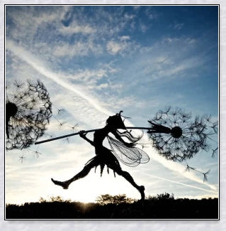 Metal fairy garden decoration with magical dandelions dancing in the wind, enchanting outdoor decor
