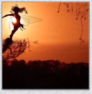 Metal fairy garden decoration with magical dandelions dancing in the wind, enchanting outdoor decor