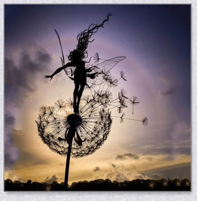 Metal fairy garden decoration with magical dandelions dancing in the wind, enchanting outdoor decor
