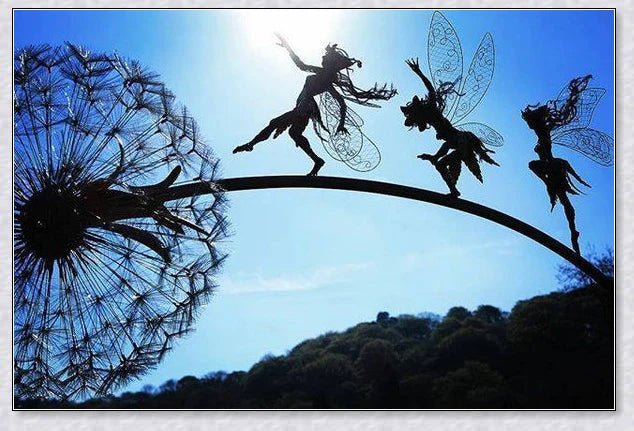 Metal fairy garden decoration with magical dandelions dancing in the wind, enchanting outdoor decor