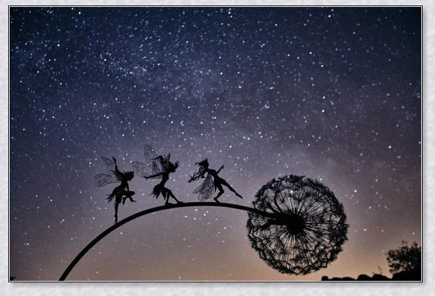 Metal fairy garden decoration with magical dandelions dancing in the wind, enchanting outdoor decor