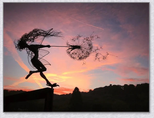 Metal fairy garden decoration with magical dandelions dancing in the wind, enchanting outdoor decor