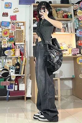 Women's high-waisted black loose straight wide-leg jeans with vintage-inspired washed finish and multiple pockets