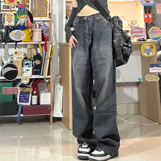 Women's high-waisted black loose straight wide-leg jeans with vintage-inspired washed finish and multiple pockets