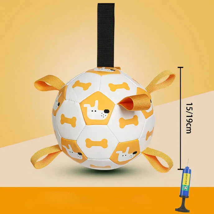 A durable leather football-shaped dog toy with grab tabs, perfect for interactive play and chewing