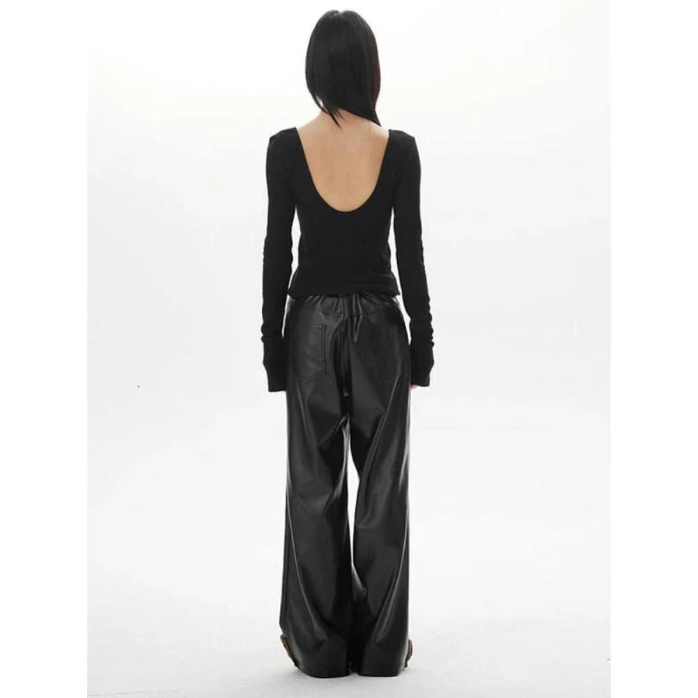 A chic backless long sleeve slim top for women in a solid pattern, perfect for casual and formal occasions.